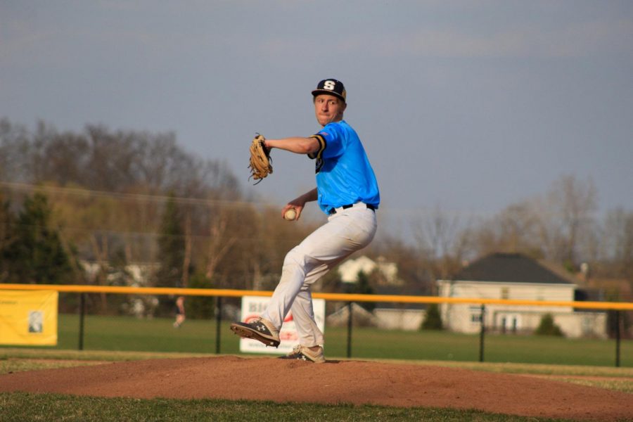 Senior+Colin+Boldin+winds+up+to+throw+a+pitch.+Boldin+broke+a+school+pitching+record+with+18+strikeouts+against+Garfield+Heights+March+29.