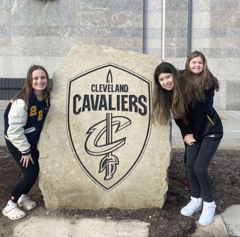 Capturing a moment outside of Rocket Mortgage Fieldhouse March 14 are seniors Lyndsey Snowdon and Lily Batten and freshman Makayla Claflin. The girls were not only there to attend the Cavs game, but to sing the national anthem beforehand with the choir.