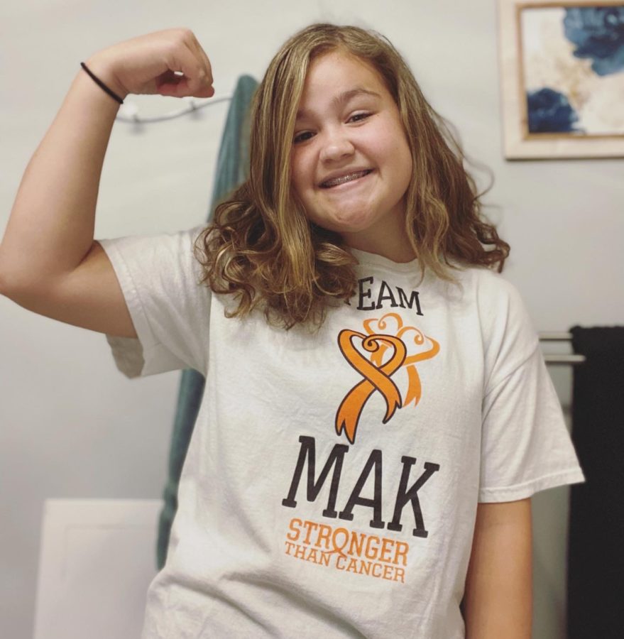 Freshman Makayla Claflin shows off her Team Mak shirt designed by friend and fellow freshman Madelyn Genovese. 