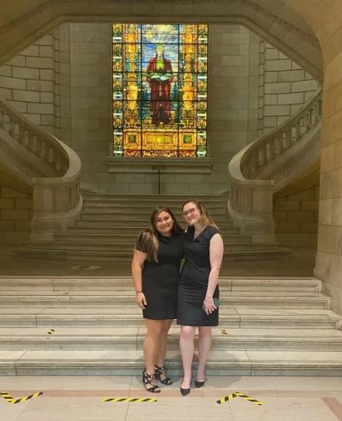 Senior Ali Madden captures a moment with her cousin, Sam Madden, at the Portage County Court of Appeals. Since Ali Madden is pursuing a degree in law, her cousin helped set up this experience to shadow a judge.